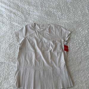 SPANX Yes, Pleats! Short Sleeve Tee in White Cloud